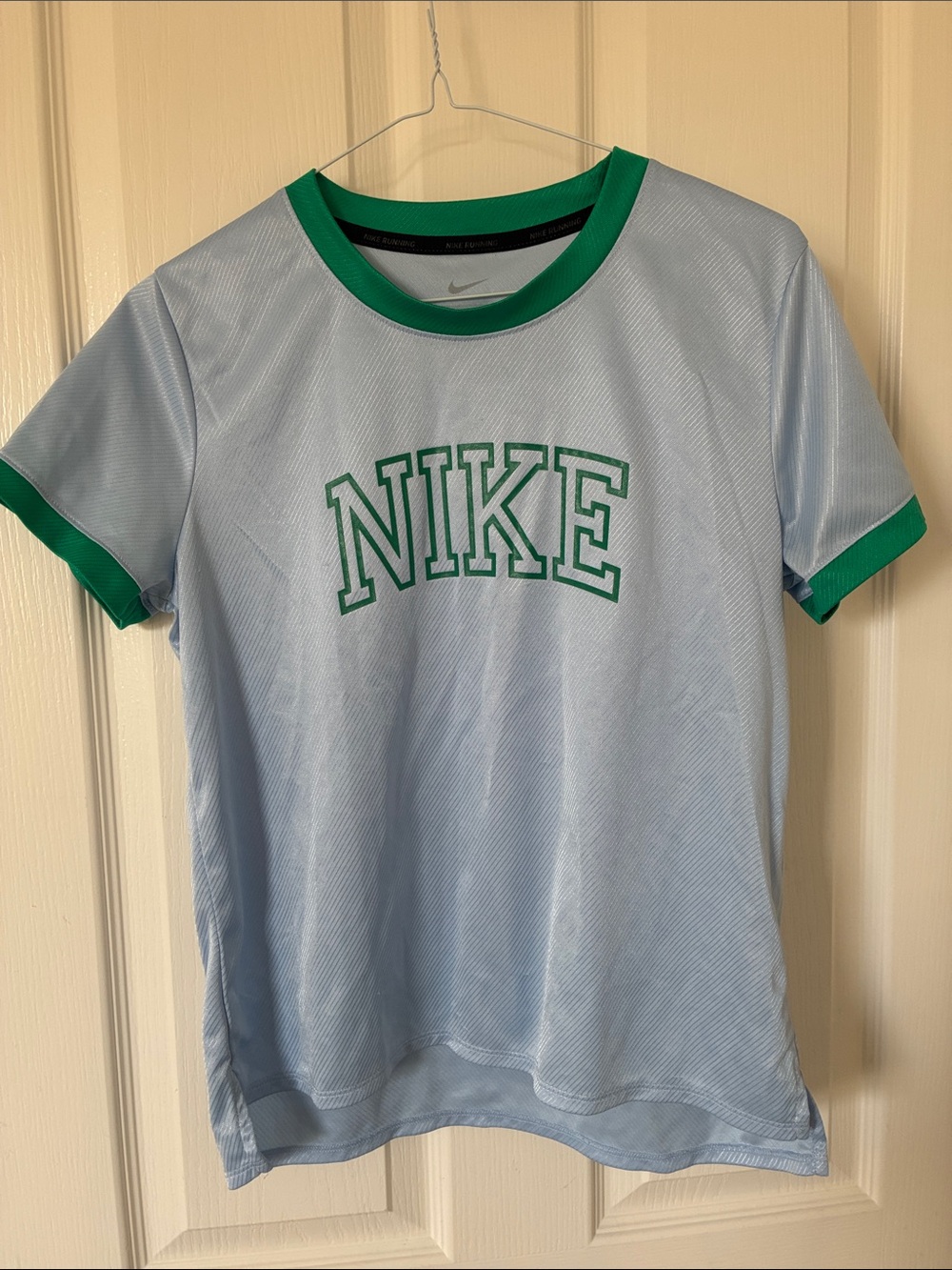 Nike Women's Light Blue Tee with Green Trim and Logo